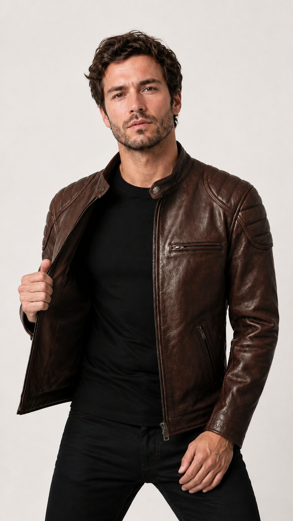 Man opening the vintage brown biker jacket — British model